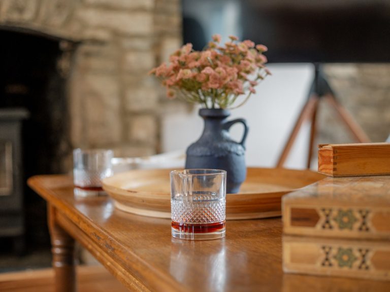 Two drinks on a table, in a romantic cottage in Dorset