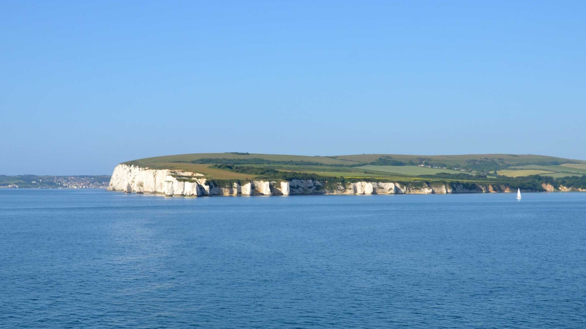 Landscape photo of the Isle of Purbeck taken from the sea