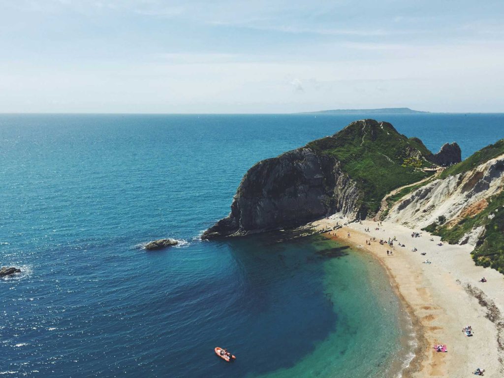 Cottages by the coast | Lulworth cove in Dorset