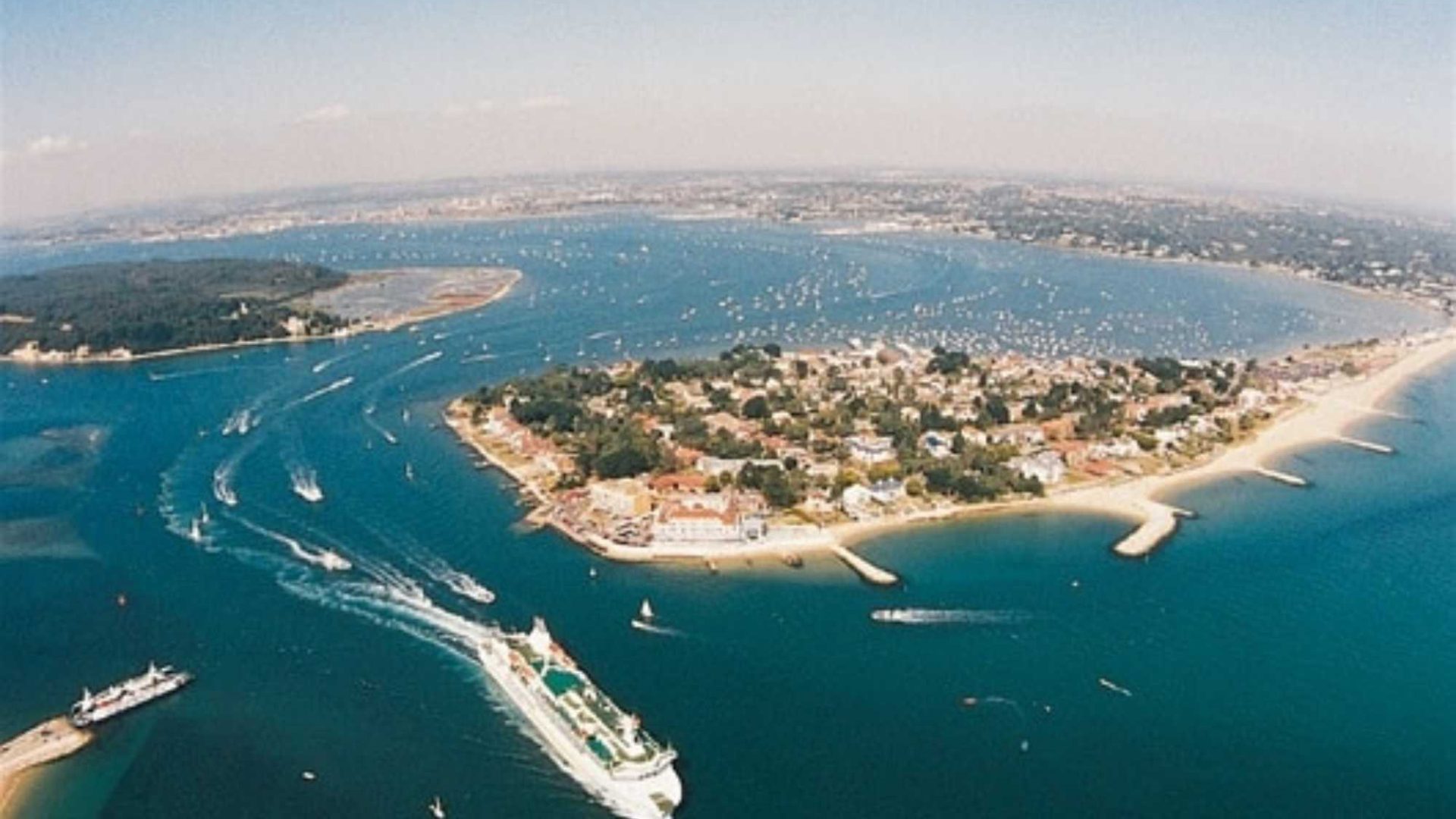 An Aerial shot of Poole Harbour and holiday cottages in Poole
