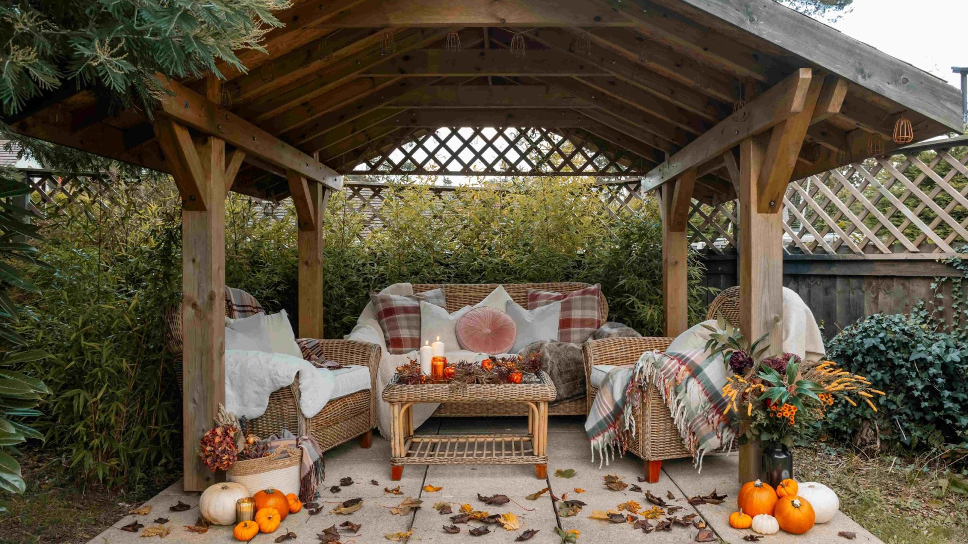 Pumpkins in an outdoor seating area at a Dorset Holiday Cottage available for October half term