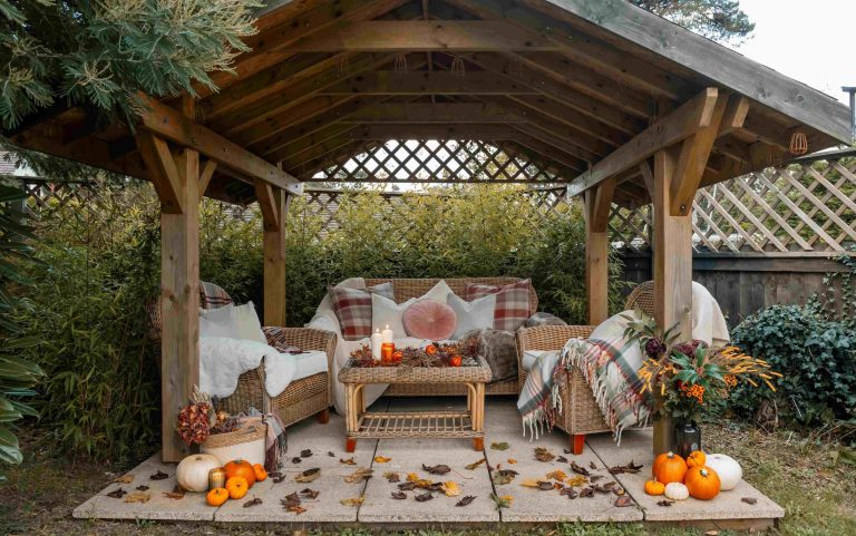 Pumpkins in an outdoor seating area at a Dorset Holiday Cottage available for October half term