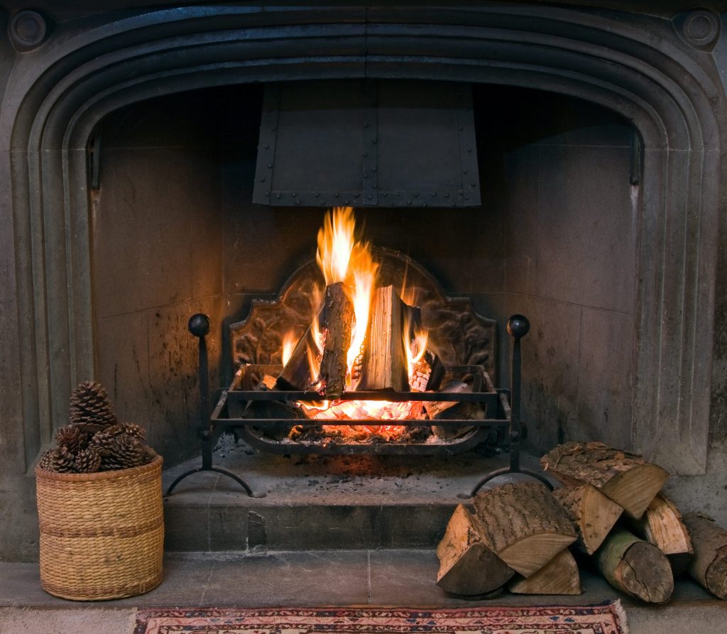 a winter fireplace in a dorset holiday cottage
