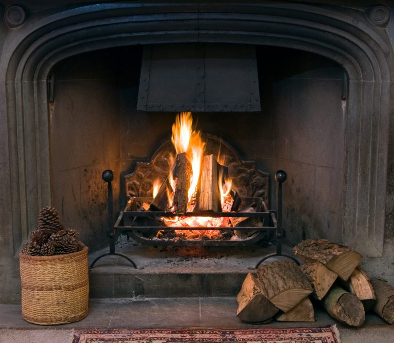 a winter fireplace in a dorset holiday cottage