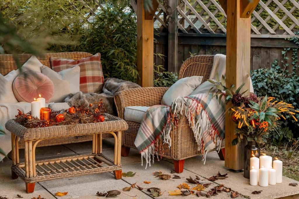 A cosy, autumn outdoor seating area at a Dorset Holiday Cottage in Sandford.