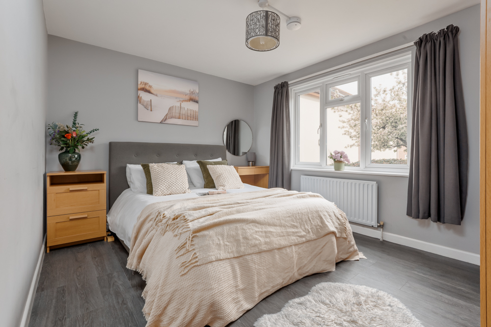 one of two bedrooms in a holiday home in dorset