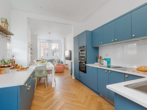 Open-plan kitchen and dining area at Beachway House holiday cottage