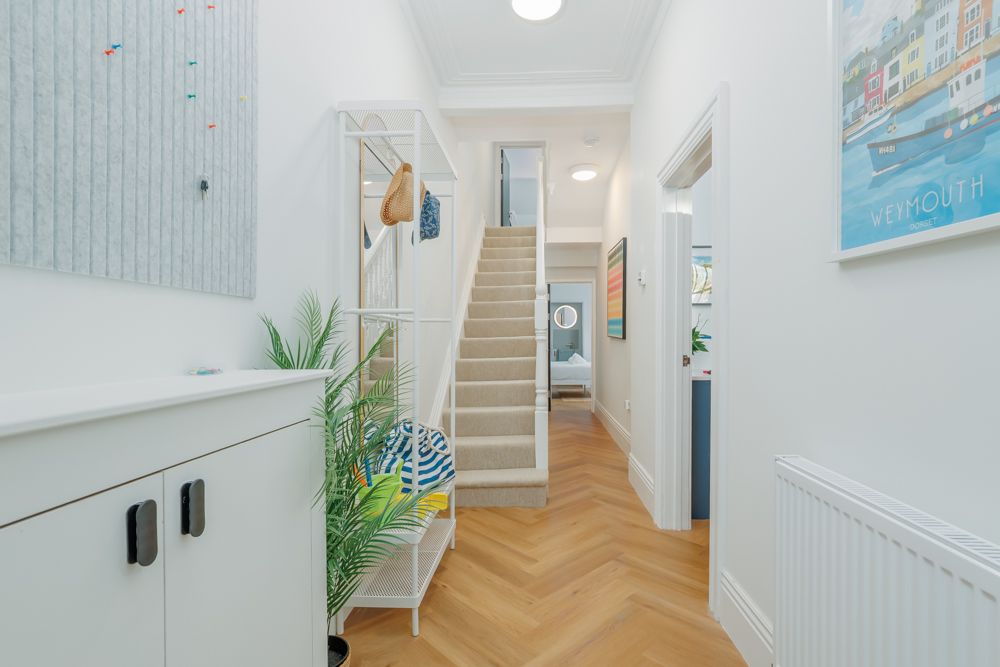 Stairway inside Beachway House holiday cottage connecting ground and upper floors