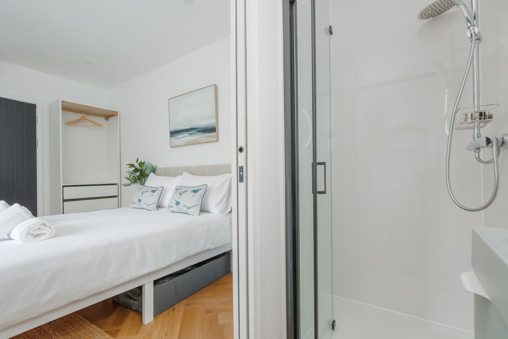 Double bed in bedroom at Beachway House holiday cottage