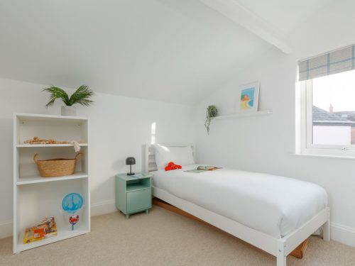 Single bed in bedroom at Beachway House holiday cottage