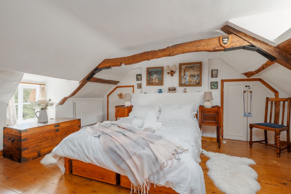 thatched cottage with beam ceilings
