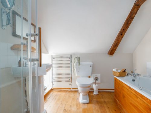 bathroom in pet friendly thatched cottage