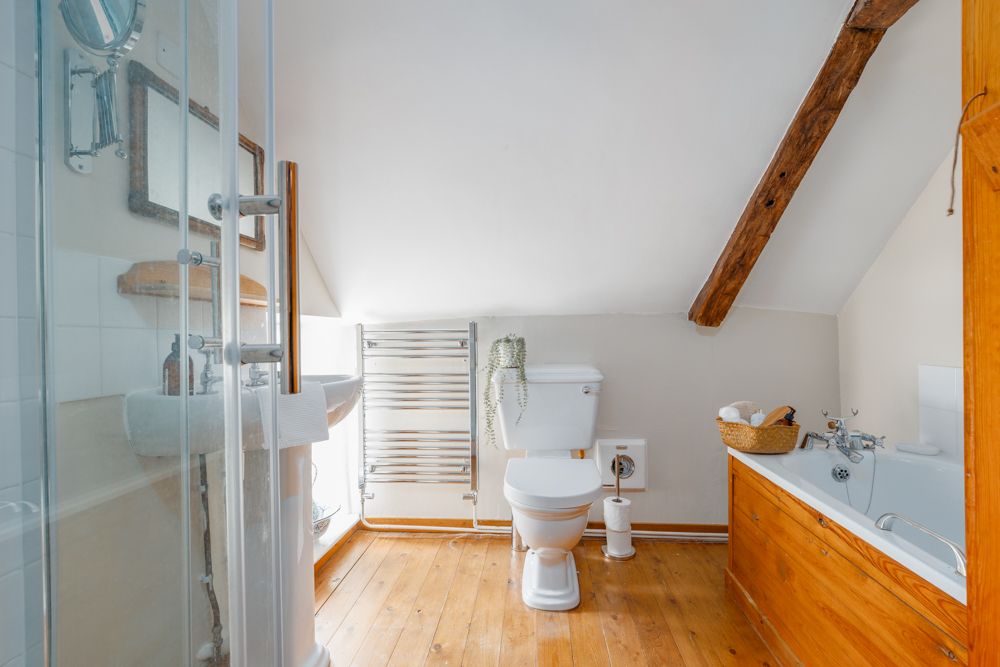 bathroom in pet friendly thatched cottage