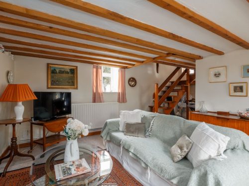 traditional lounge in pretty cottage