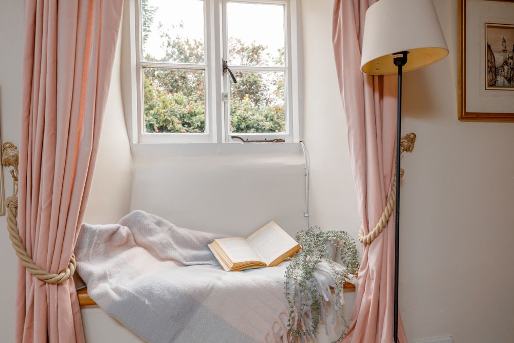 window seat in thatched cottage