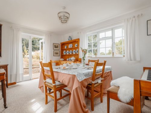 dining room in pet friendly thatched cottage